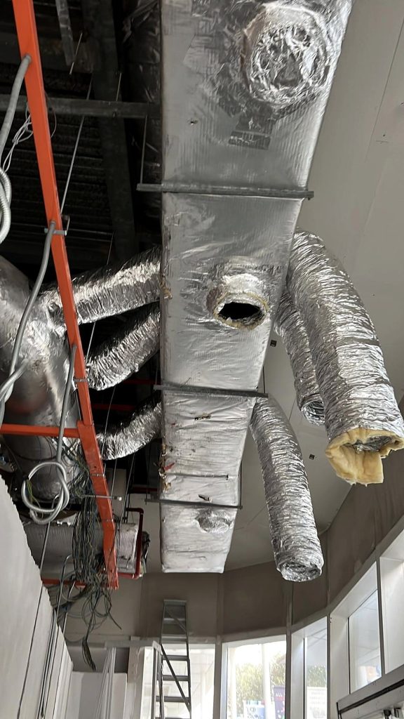 Insulated duct branch connection on existing ductwork